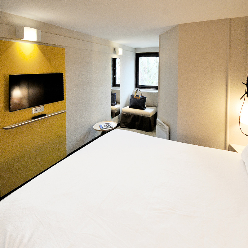 Chambre Ibis triple avec 1 lit double et 1 lit simple