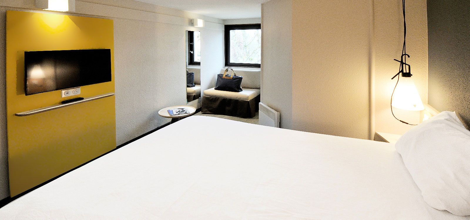 Chambre Ibis triple avec 1 lit double et 1 lit simple